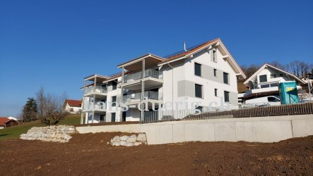 Mehrfamilienhaus mit Erdsonden-Wärmepumpe und Photovoltaik